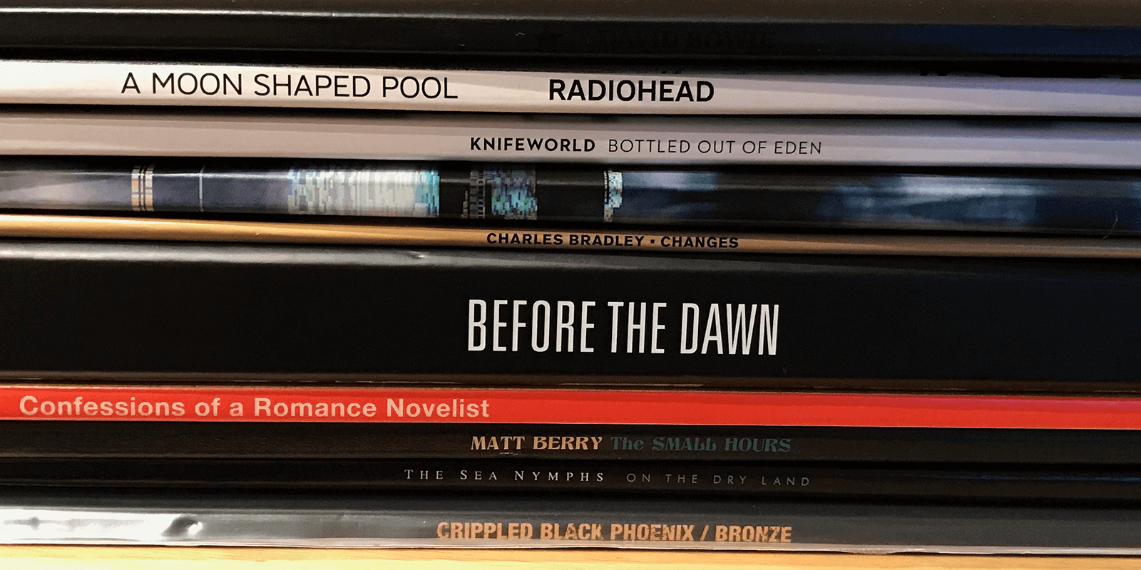 Explore Russ Mckendrick's top ten albums of 2016, including works by David Bowie, Radiohead, and Knifeworld. Dive into the diverse sounds of the year.